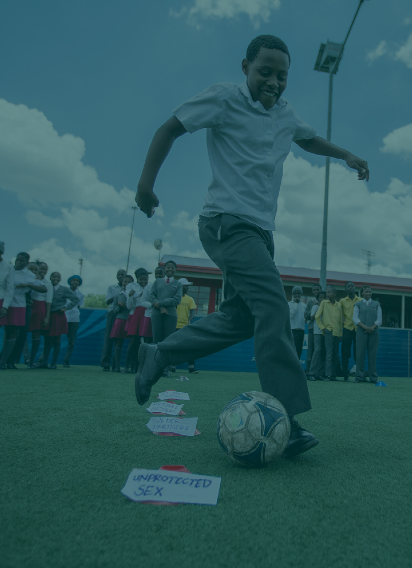 Child playing soccer